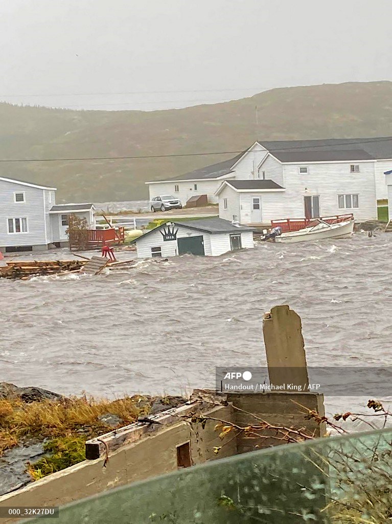 Fiona smashes into Atlantic Canada, washing away homes and